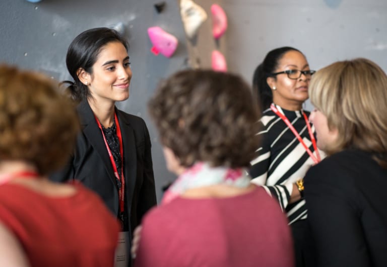 Women talking at event