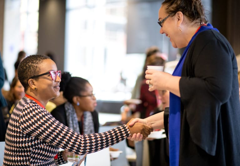 Women shaking hands